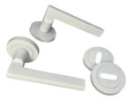 Manija 1012 Doble C/bocallaves Y Sistema C/resorte Blanco